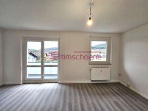 Wohnzimmer mit Balkon